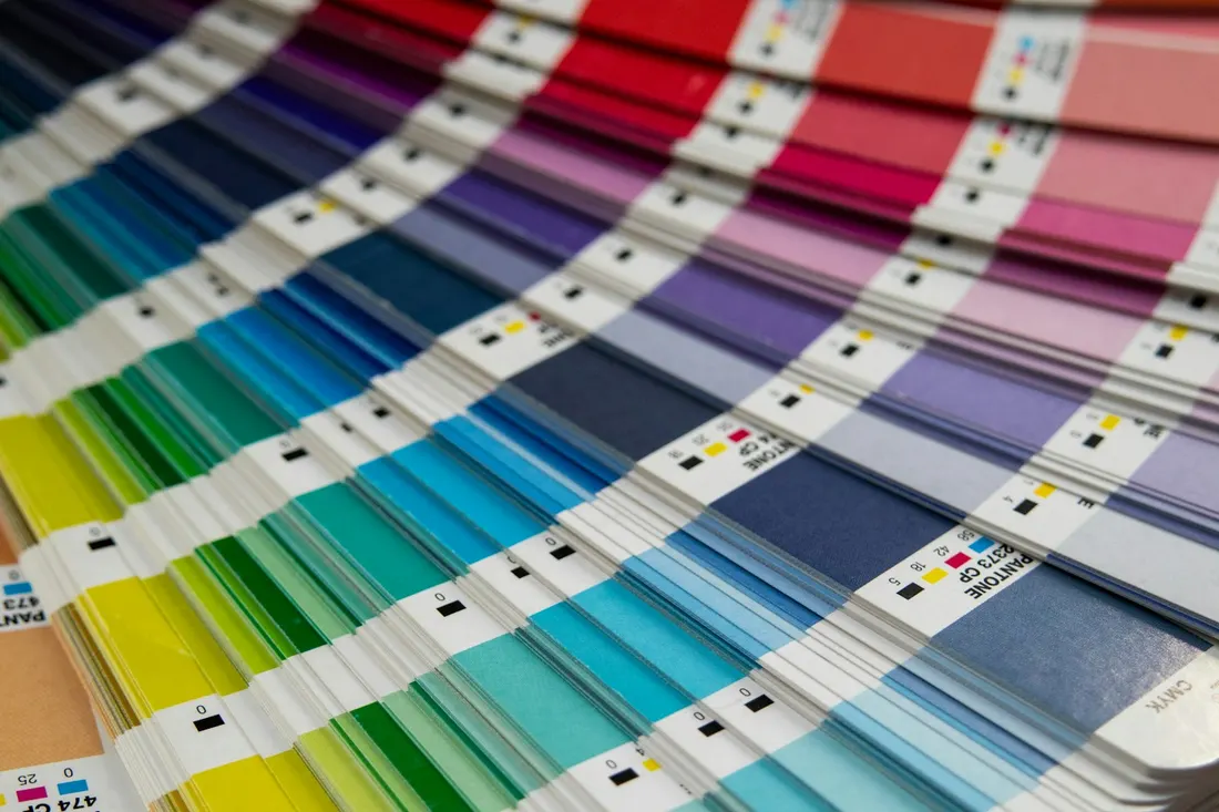 Paint sheen swatch cards from flat matte to high gloss compared side by side